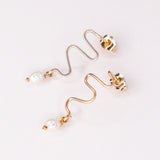 Delphes - Boucles d'oreilles pendantes serpent perle de culture or argent 